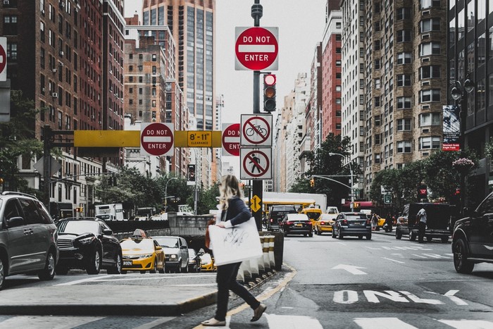 New York City street with traffic and signs