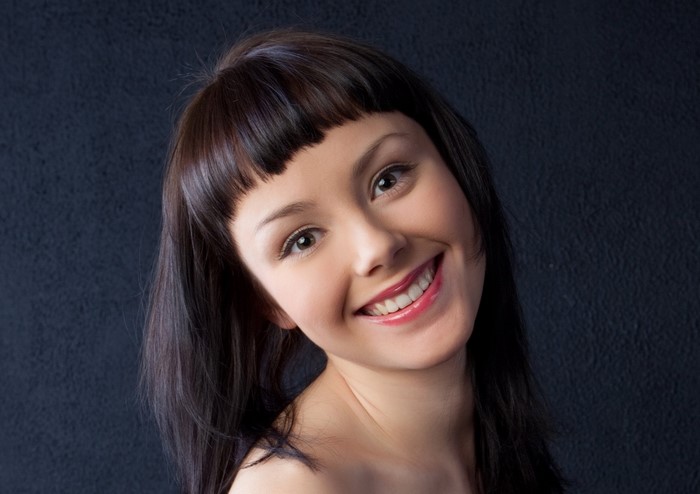 Smiling Woman with Dark Hair Portrait