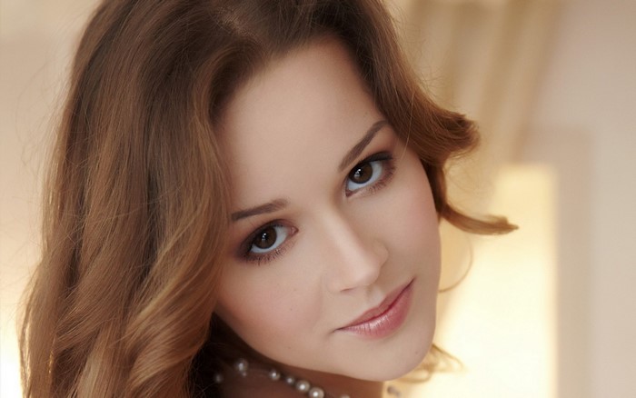 Close-Up Portrait of a Young Woman with Brown Hair