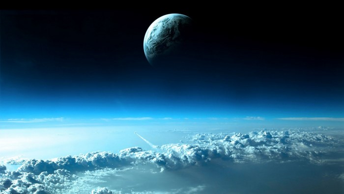 Planet in space above clouds with a rocket