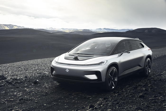 Faraday Future FF91 electric car in a rocky landscape