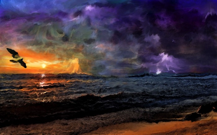 Bird flying over stormy sea at sunset