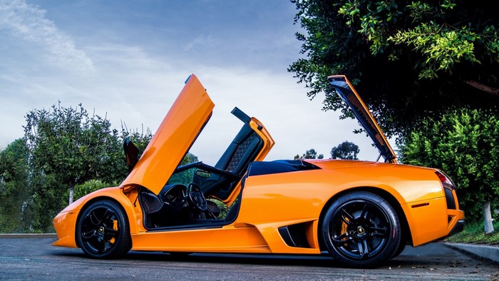 Orange Lamborghini Murcielago LP650-4 Roadster with Doors Open