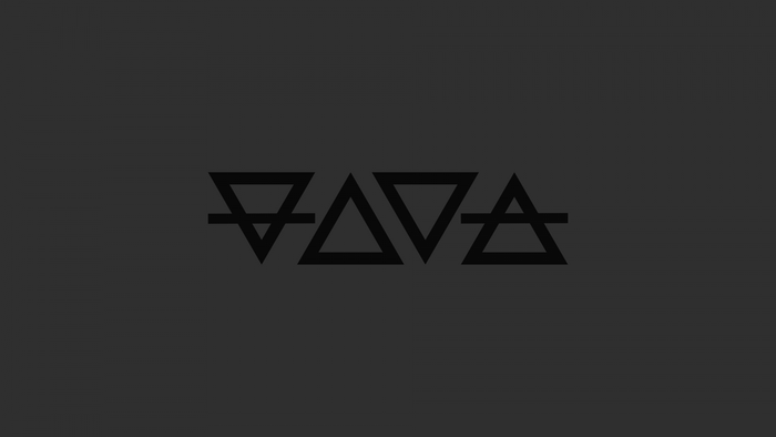 Four elemental symbols on a dark background
