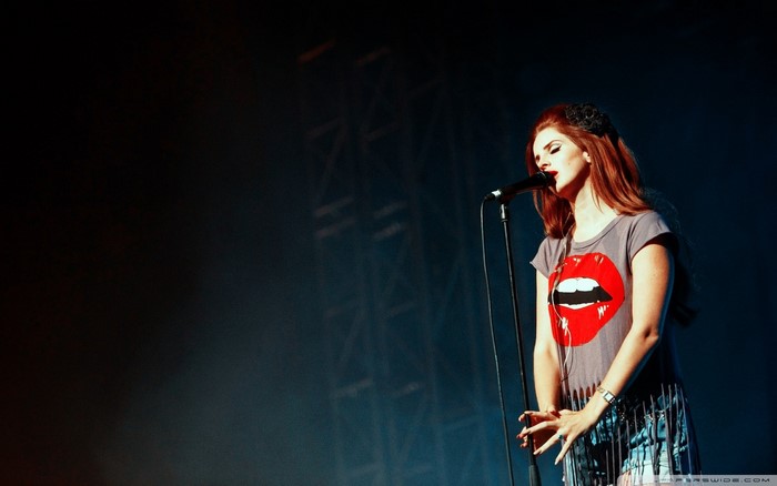 Lana Del Rey performing on stage
