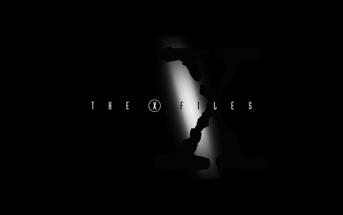 The X-Files logo with silhouette in spotlight