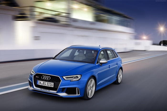 Blue Audi RS 3 Quattro on a Racetrack