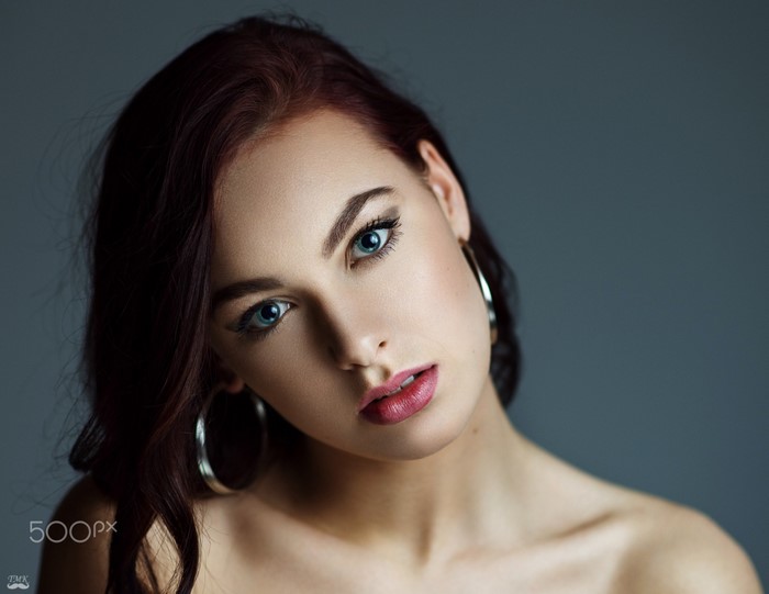 Woman with blue eyes and red hair, portrait