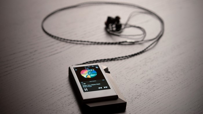 Astell & Kern AK380 digital audio player with earbuds