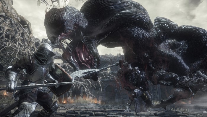 Knight fighting a large monster in Dark Souls III