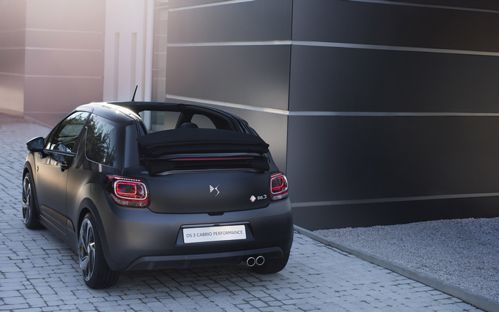 Matte black DS 3 Cabrio Performance parked on cobblestone