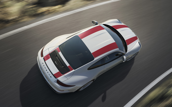 Porsche 911 R driving on a road