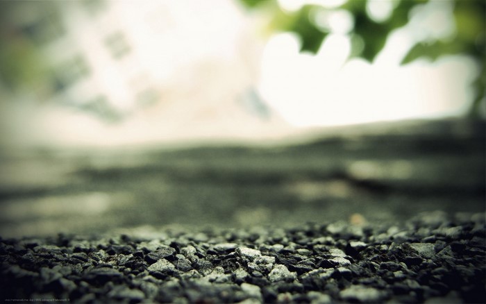 Close-up of stones with blurred background and sunlight