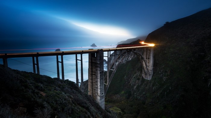 Bixby Bridge at night with light trails