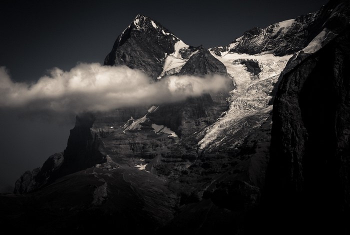 Monochrome view of the Swiss Alps with clouds