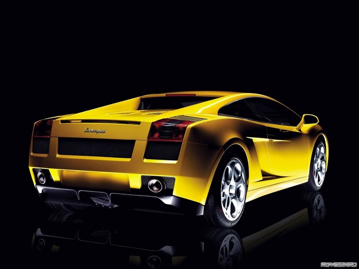 Yellow Lamborghini Gallardo parked on a reflective surface