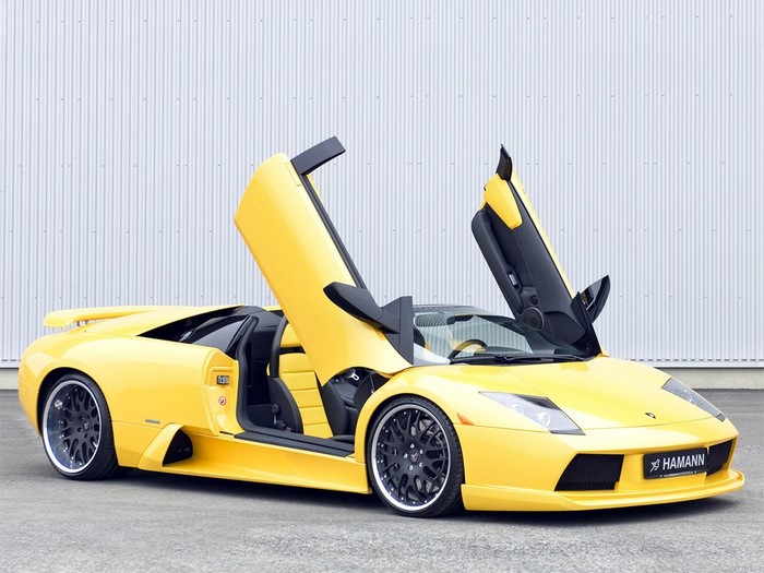 Yellow Lamborghini Murcielago with doors open