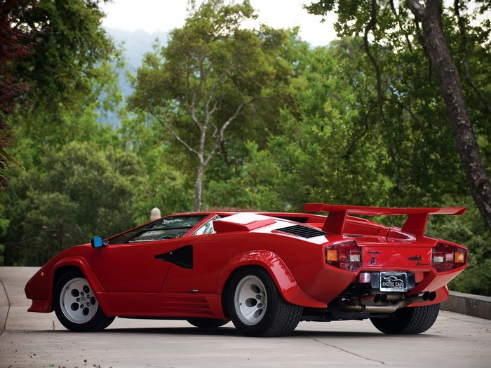 Red Lamborghini Countach parked outdoors
