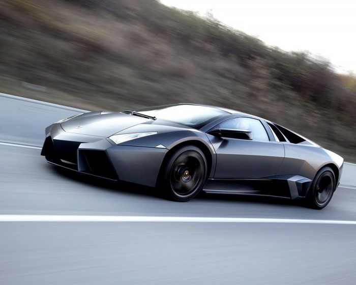 Lamborghini Reventon driving on a road