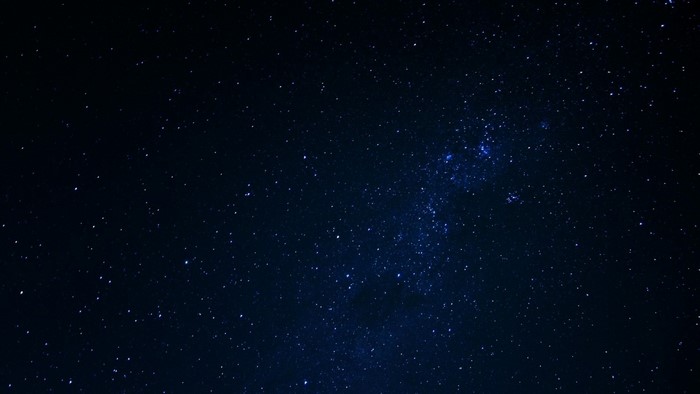 Starry Night Sky with Nebula and Constellations