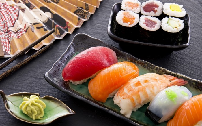Japanese sushi and sashimi platter with fan