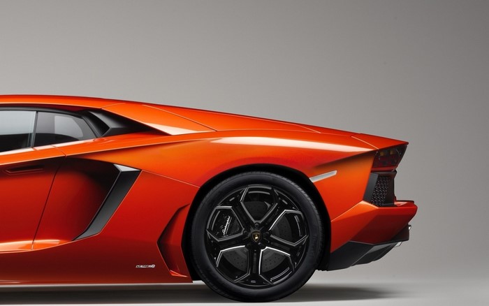 Orange Lamborghini Aventador sports car rear wheel