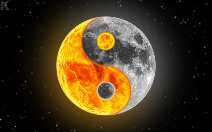 Yin Yang symbol with Sun and Moon in space