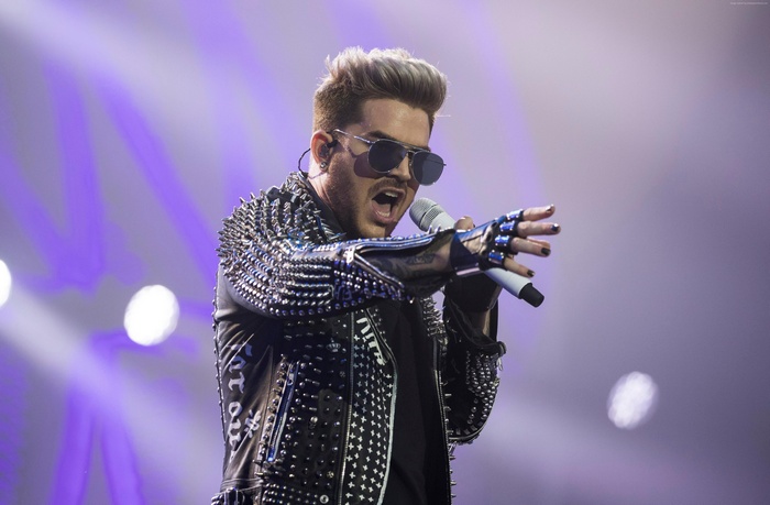 Adam Lambert performing on stage