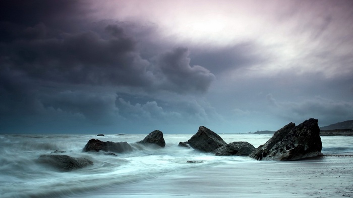 Stormy Seascape with Jagged Rocks and Waves