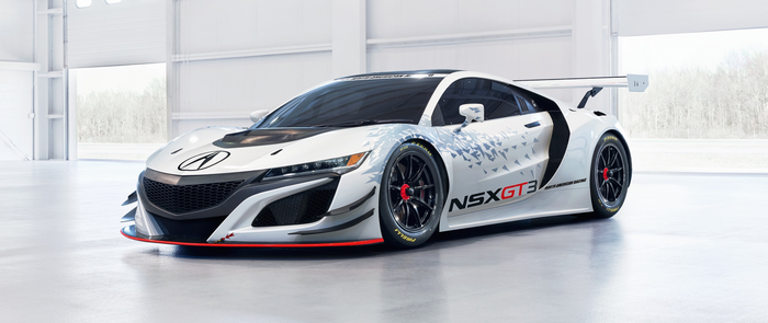 White Acura NSX GT3 race car in a garage