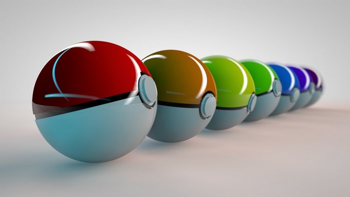Row of colorful Pokemon balls on a white background