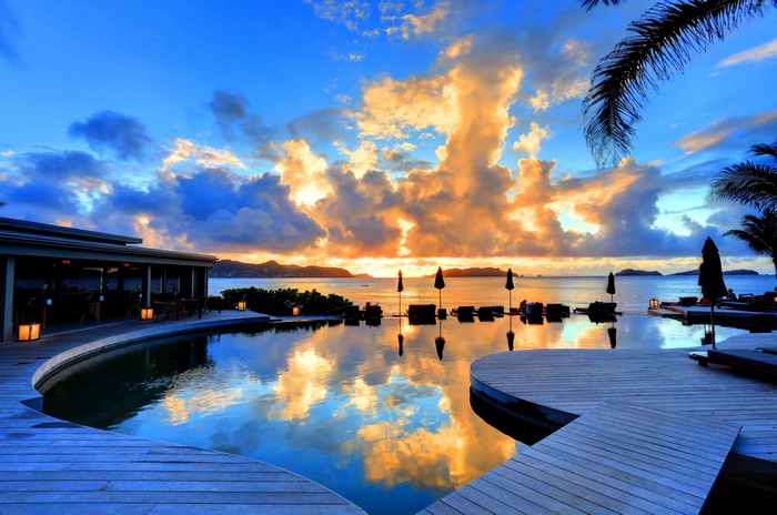 Infinity pool at sunset with ocean view