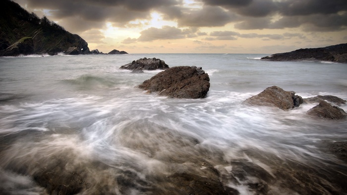Waves crashing on rocks at a rocky coastline