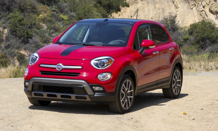 Red Fiat 500X parked on a dirt road