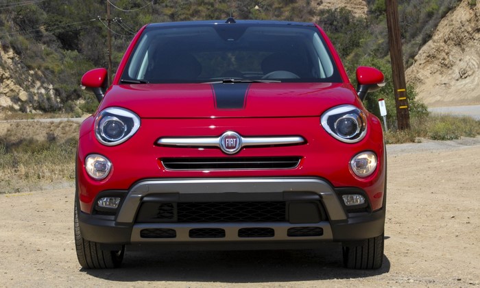 Red Fiat 500X parked on a dirt road