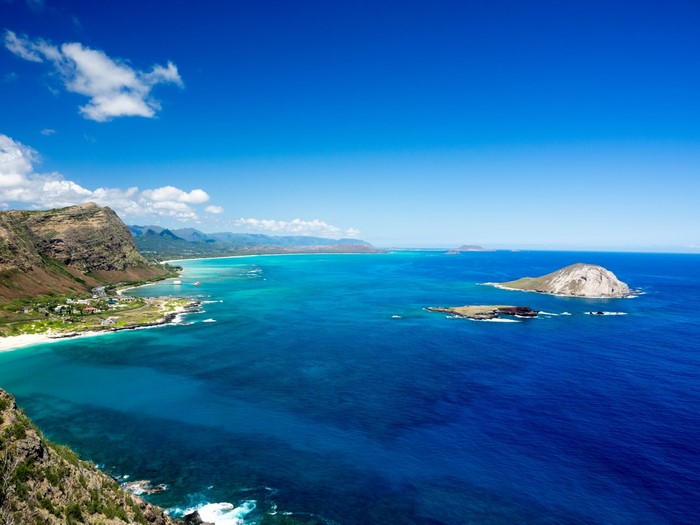 Aerial view of Oahu coastline with islands in the ocean