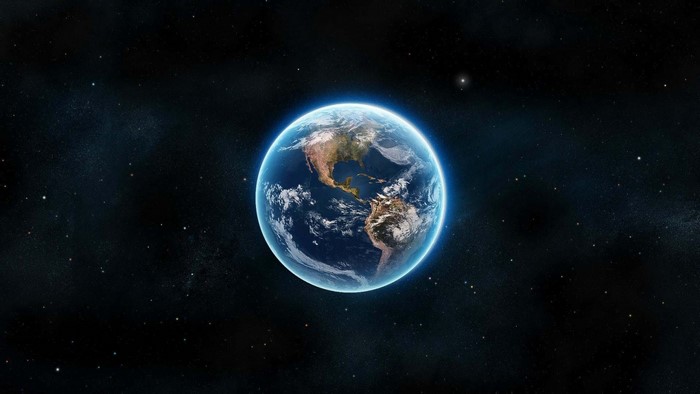 Earth from space with stars and nebulae