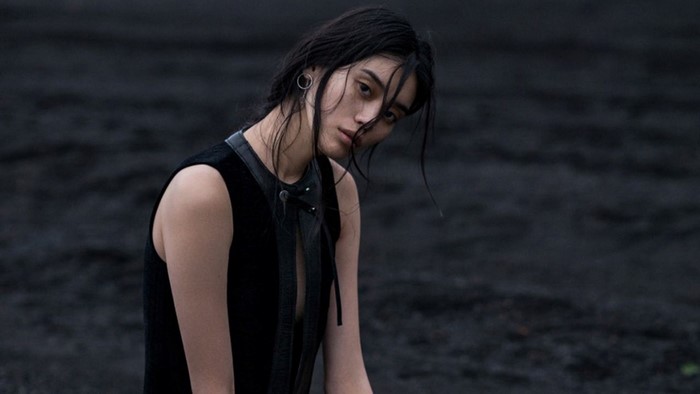 Model Ming Xi in black fashion photoshoot