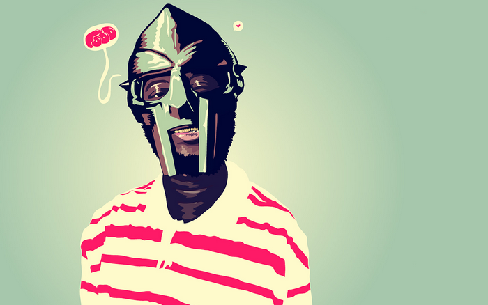 MF DOOM wearing a metal mask and striped shirt