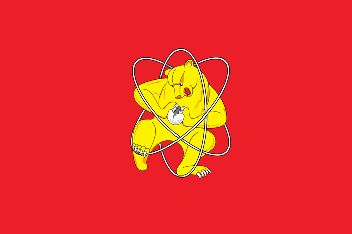 Yellow bear with atom symbol on red background