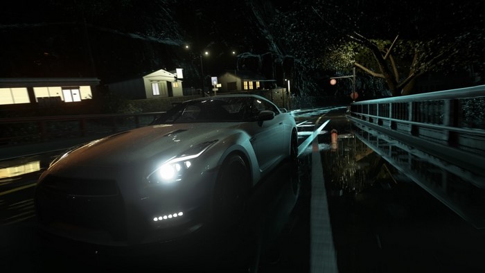 Nissan GT-R R35 on a wet road at night