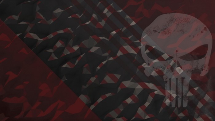 The Punisher Skull on a Red and Black Abstract Pattern