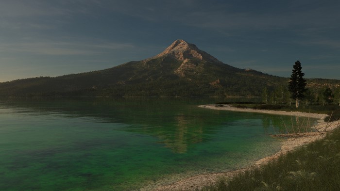 Mountain reflected in a clear lake at dawn