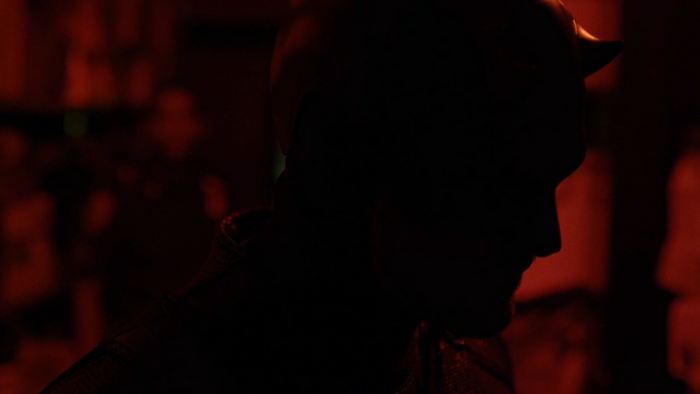 Daredevil in silhouette with red lighting