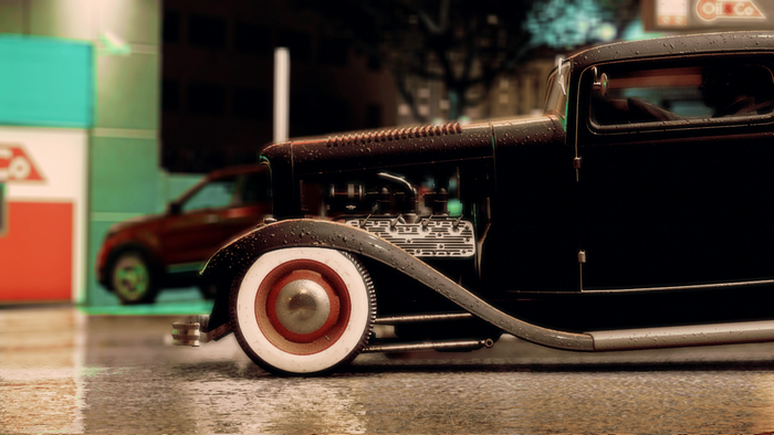 Black Rat Rod Hot Rod car on wet street