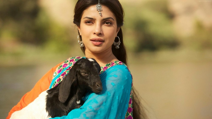 Priyanka Chopra holding a goat