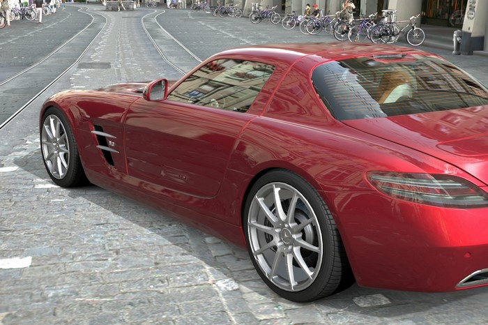 Red Mercedes-Benz SLS AMG on a cobblestone street