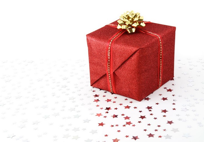 Red glitter gift box with gold bow and ribbon