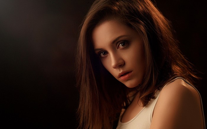 Portrait of a young woman with brown hair