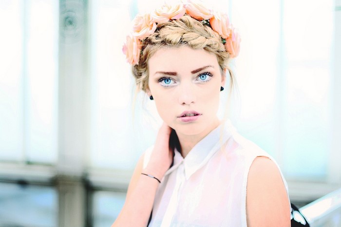 Woman with blue eyes and flower crown
